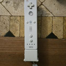 Wii Controller With Motion Plus Adapter.