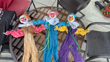 3 hanging scary Halloween clowns
