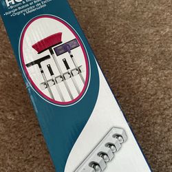 Magic holder. 5 slots Broom n mop holder. New in box. Never used