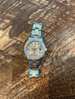 Rolex date just 26mm oyster band, diamond bezel.