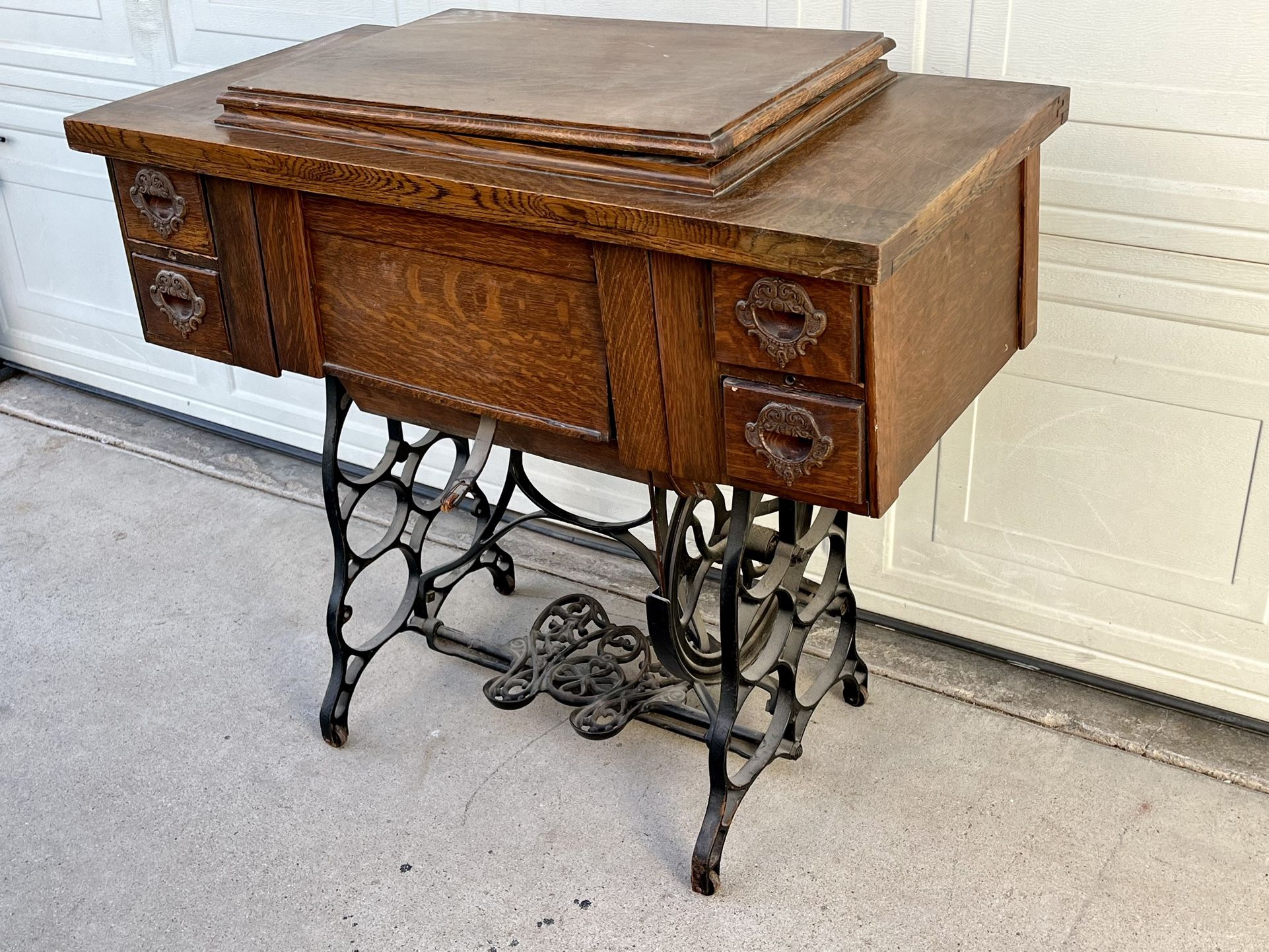 Antique Bruce Treadle Sewing Machine In Oak Cabinet, Cast Iron Base.