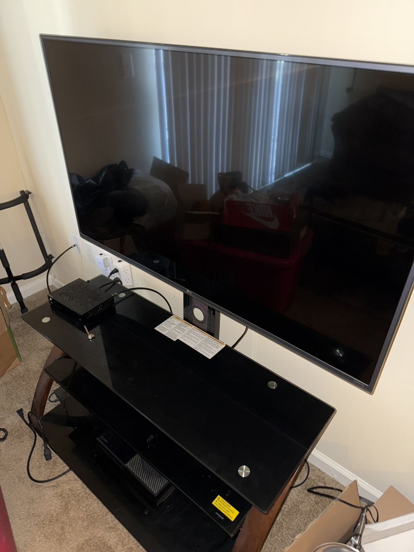 55’ WebOs LG Smart TV w/ FREE TV STAND