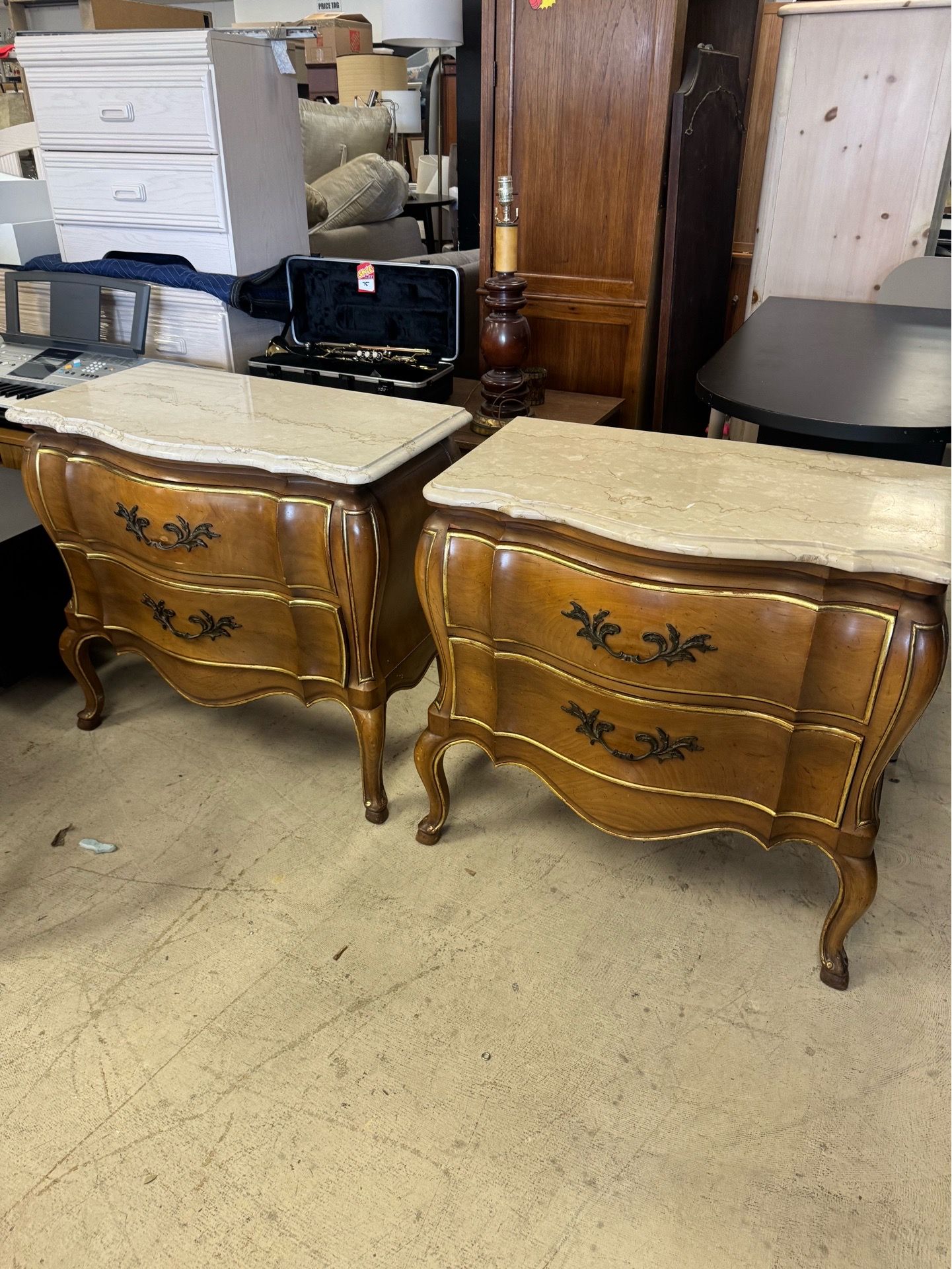 Pair of Louis XV style bombé-form commodes