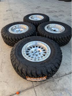18x9 New KMC wheels with new 35x12.50r18 arroyo R/T tires for RAM 1500 Ford F150