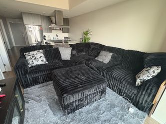 Black Sectional + Ottoman