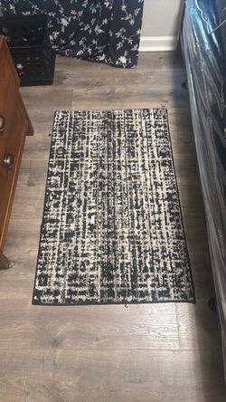 Black and Cream Abstract Area Rug