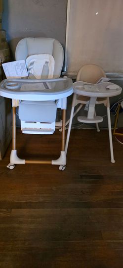 2 brand new high chairs, $70 for the one on the left $40 for the one on the right