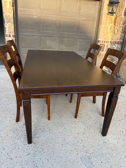 Dining table and 4 chairs