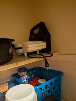 Kitchen appliances: toaster, foreman grill, bread machine,hand mixer, waffle iron