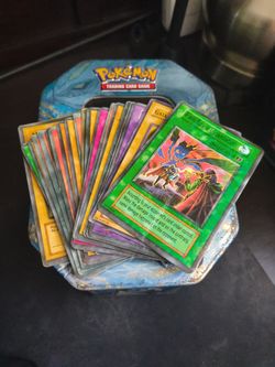 Pokemon Tin w/ Random Yu-Gi-Oh Cards