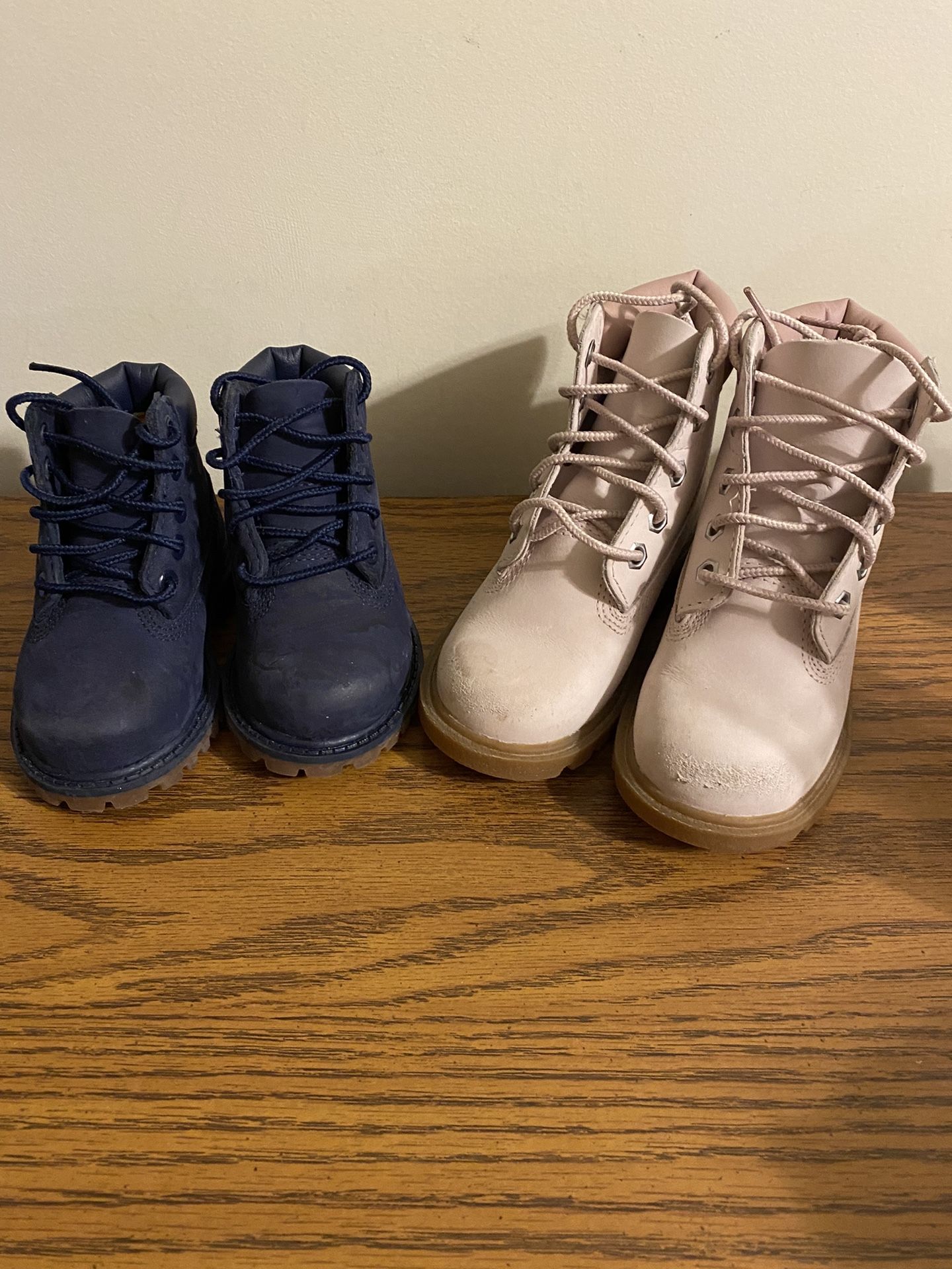 Two Pair Of Boys And Girls Timberland Boots That Are $12.00 Each