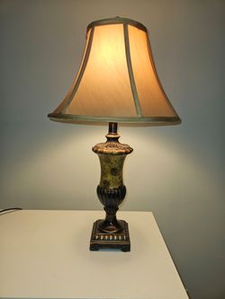 Elegant vintage table lamp with ornate design