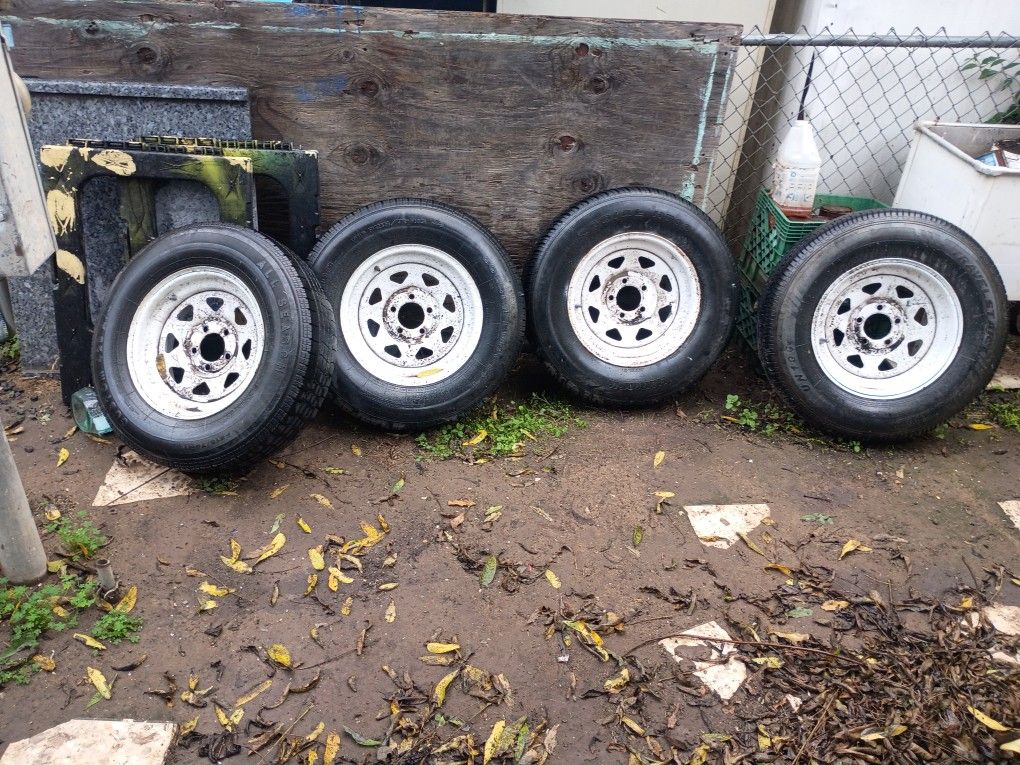 NEW TRAILER TIRES AND RIMS 215/75/15