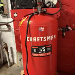 Craftsman 80-gallon, 175 PSI vertical air compressor.