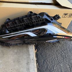 Used passenger side headlight assy