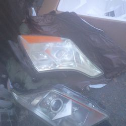 Pr. Of Front Lights For A Cadillac Srx