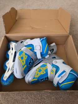 Boy roller blades/ skates