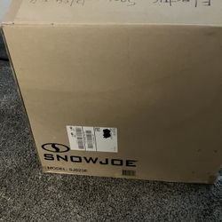 SNOWJOE Electric Snow Blower. New Never Been Used. Need To Be Assembled
