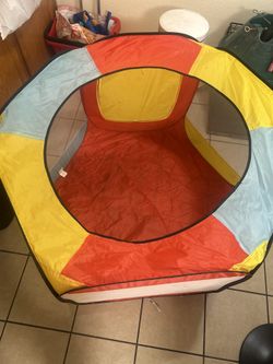 hexagonal pop-up play tent and ball pit.