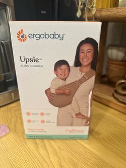 Upsie baby carrier.