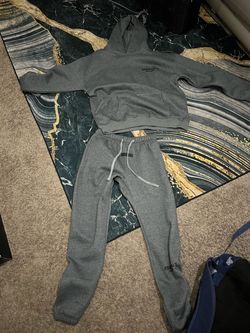 the new dark gray essentials jogger suit