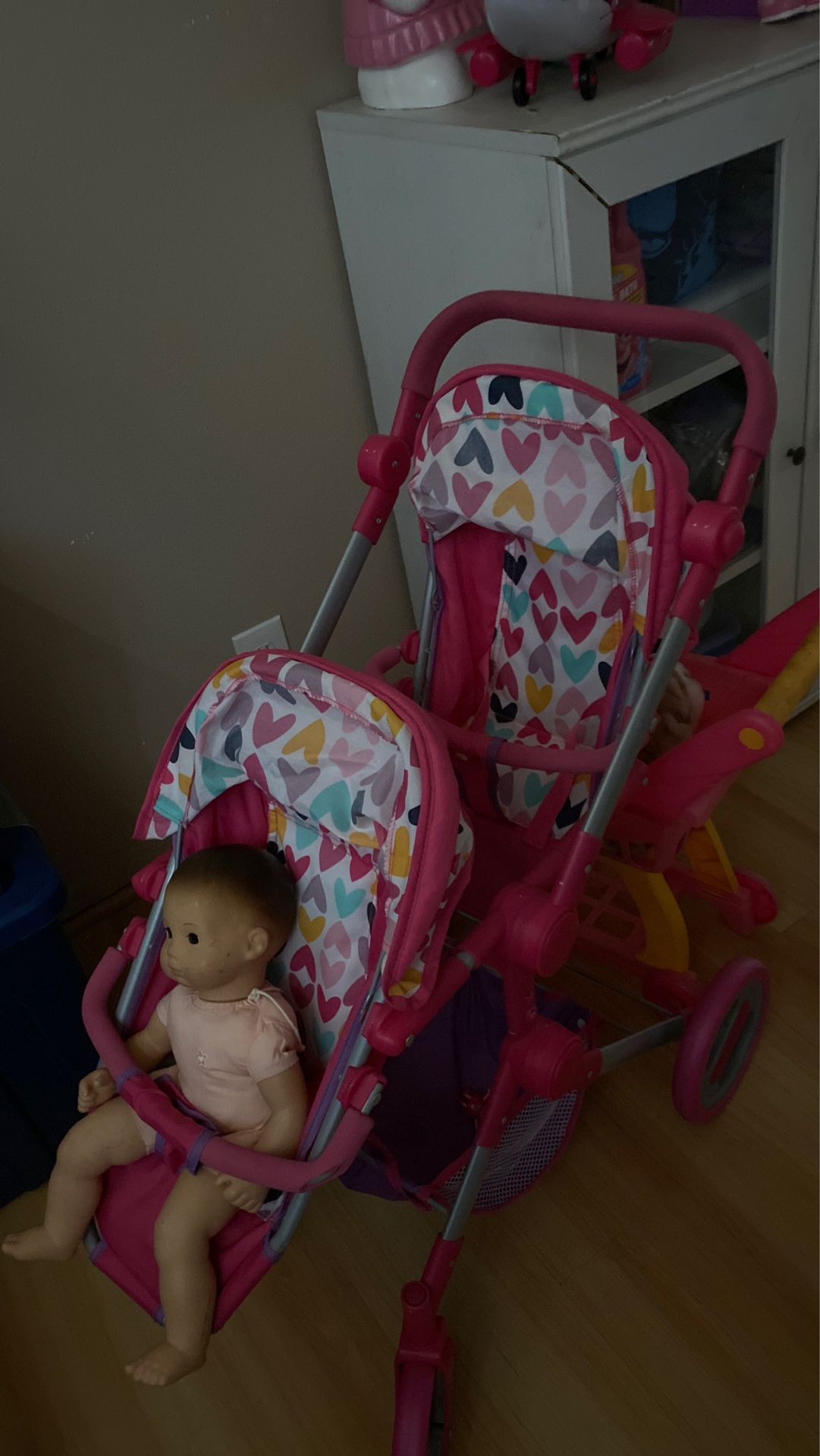 Double stroller toy for two dolls