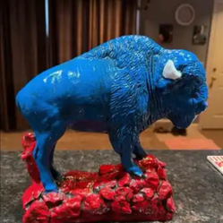 Red, white and blue buffalo statue