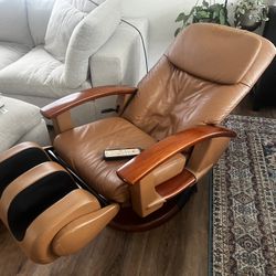 Delivery Available! Human Touch Technology Massage Chair! Remote Control Operated, works great!  Leg rest has a calf massager as well.  28x38x44in Sea