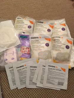 Brand new 30 pads of Nursing pads and 7 bags of tender care