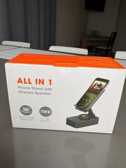Phone stand with wireless speaker
