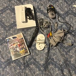 Nintendo Wii + Super Smash Bros. Brawl