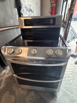 LG stove 30 wide 2 oven silve wich blue oven electric 220