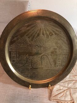 Golden Egyptian metal plate