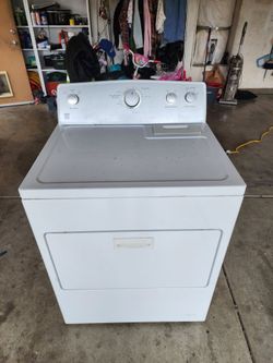 Kenmore electric dryer completely gone through cleaned out oiled ready to go Works excellent