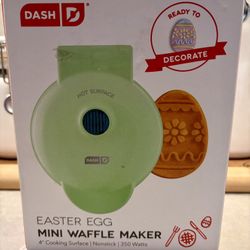 Cute Dash Easter Egg Mini Waffle Maker. New in box. Has 4 inch cooking surface, nonstick