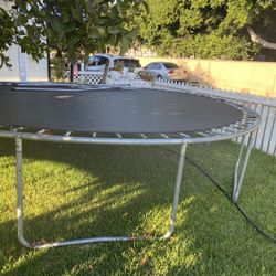 15 Ft Trampoline Good Cond Net Included!$60