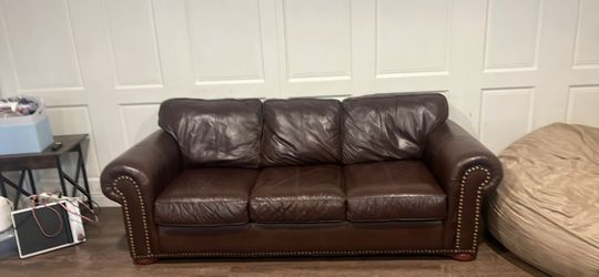 Ashley furniture couch 100% leather with buttons
