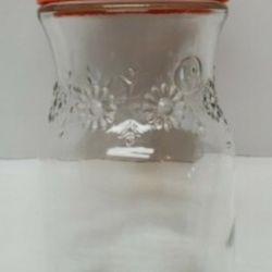 Vintage Anchor Hocking Glass Tang Jar with Orange Lid Approximately 7.5 inches