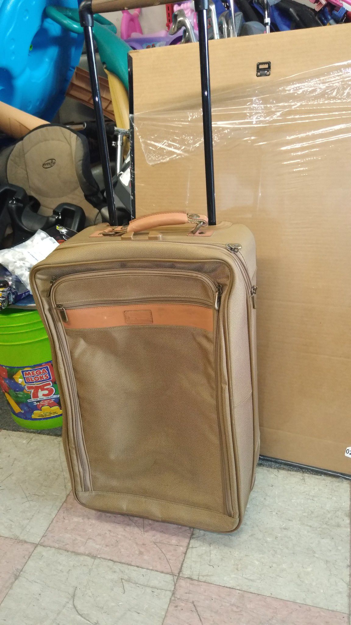 Carry on size luggage with wheels and handle