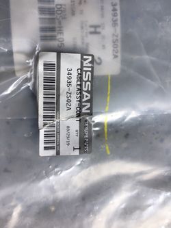 Nissan Frontier 08 20. Cable dela palaca está nuevo ela bolsa