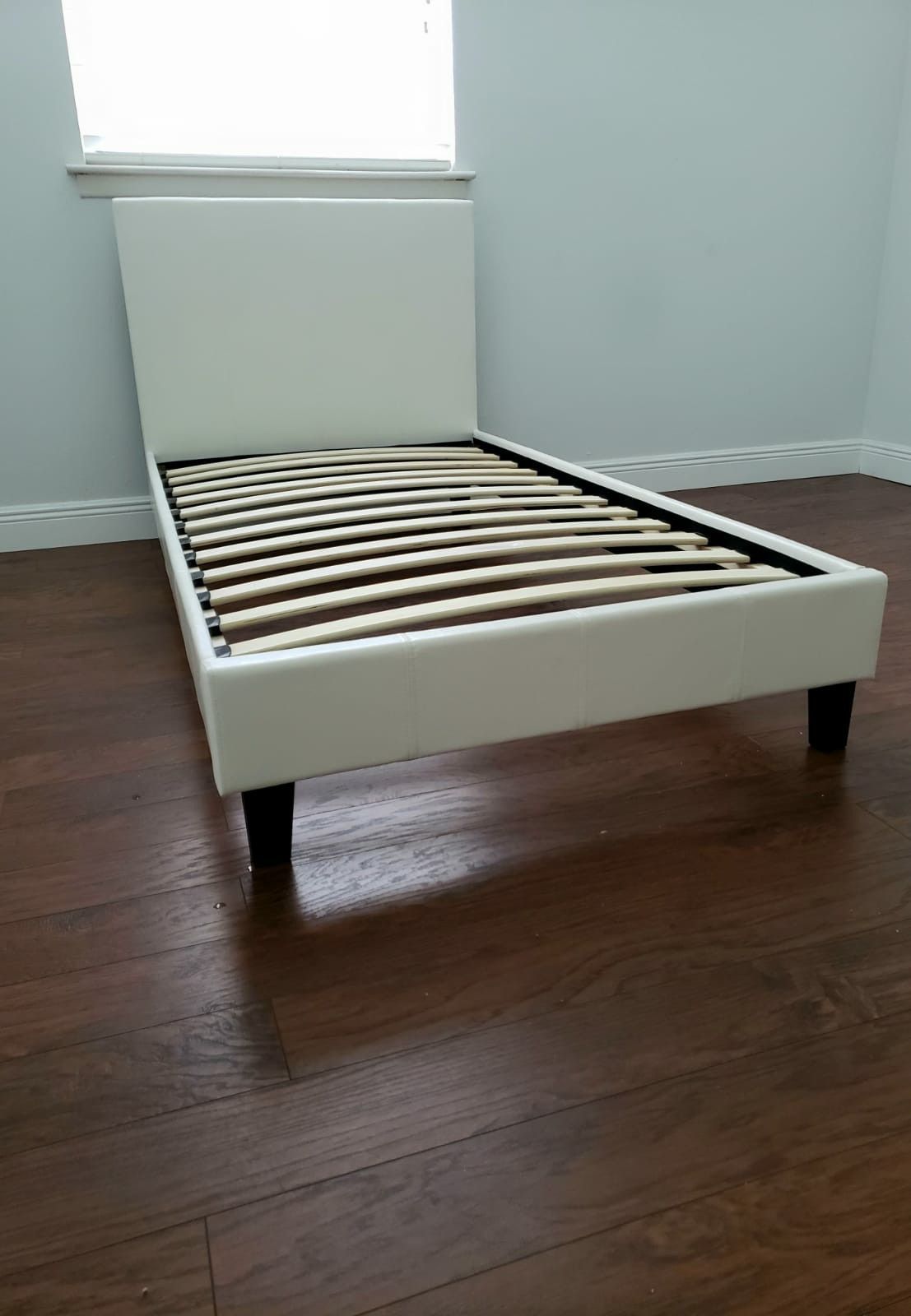 NEW TWIN UPHOLSTERED BED FRAME. Mattress sold separately