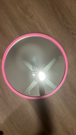 Round pink mirror about 16”