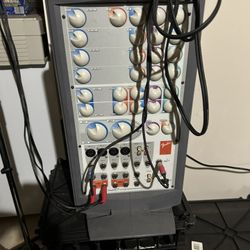 Fender audio mixer with multiple inputs and controls.