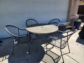 Metal table with 4 chairs