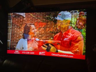 Curved 55 inch TV and sound bar