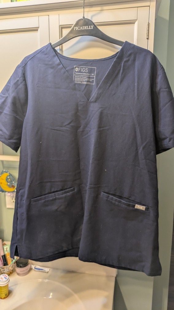 Assorted Scrub Tops And Bottoms.