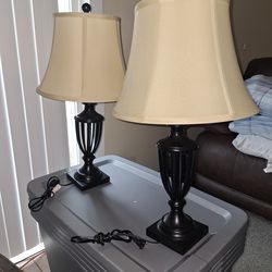 Set of black stylish lamps with shades