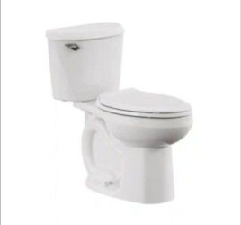 American Standard Reliant 12 in. Rough In 2-Piece 1.28 GPF Single Flush Elongated Toilet with Slow Close Seat in White