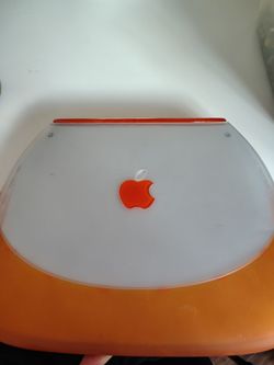 Clamshell vintage apple laptop tangerine