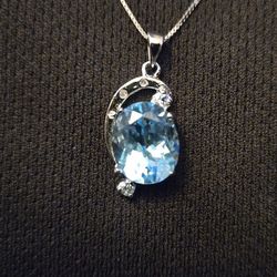 Silver Necklace with Oval Blue Topaz Pendant on Box Chain